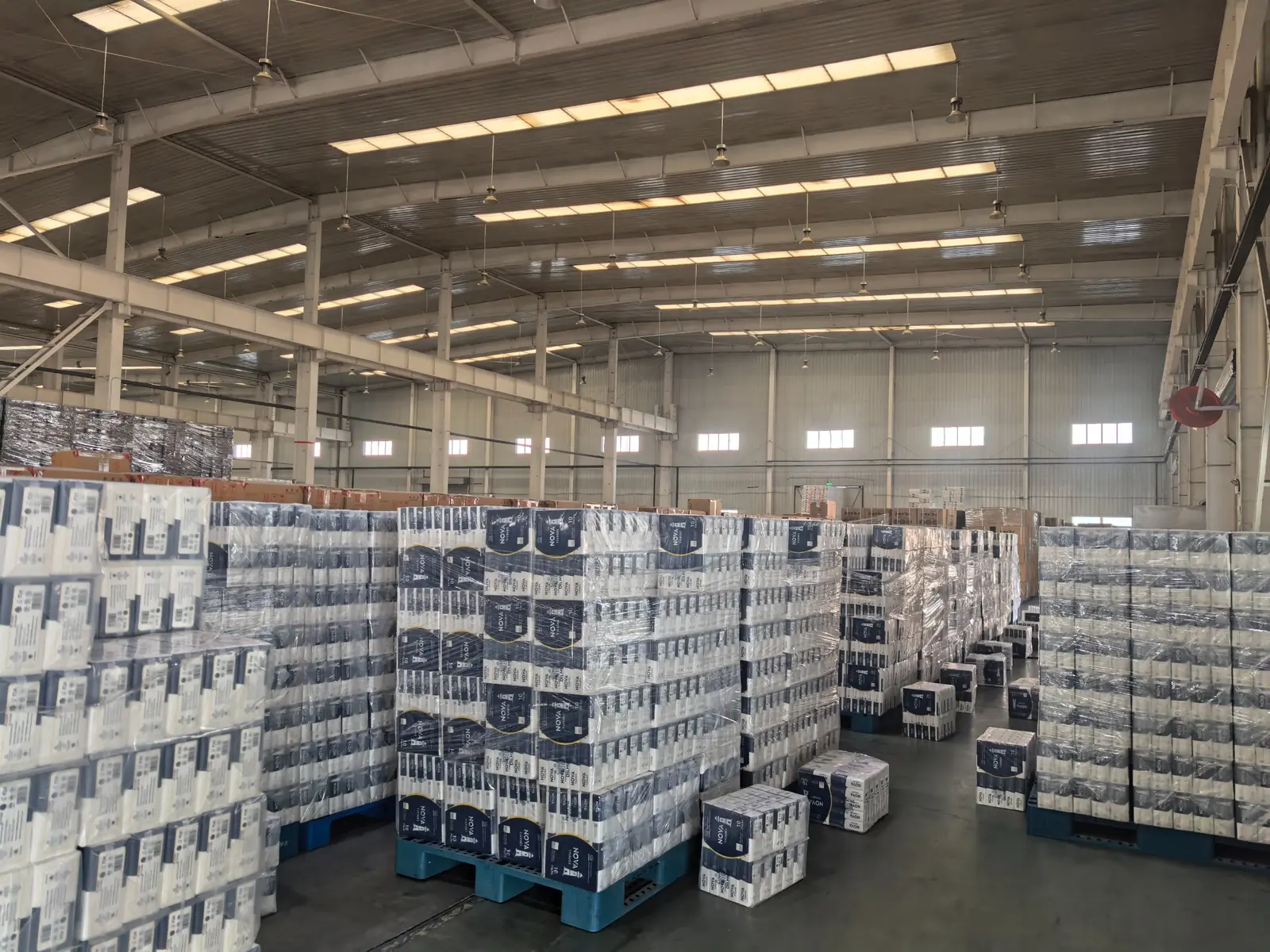 Pallets of Nova Tissues stock in a distribution warehouse, ready to ship